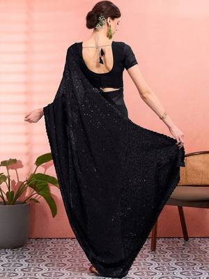 Black ethnic embroidered festive wear saree with matching blouse 2