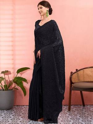 Black ethnic embroidered festive wear saree with matching blouse 3