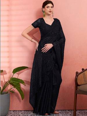 Black ethnic embroidered festive wear saree with matching blouse 5