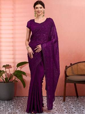 Purple ethnic embroidered festive wear saree with matching blouse 1