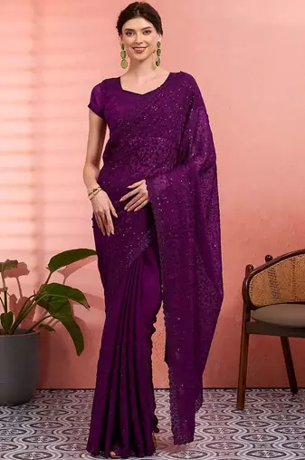 Purple ethnic embroidered festive wear saree with matching blouse