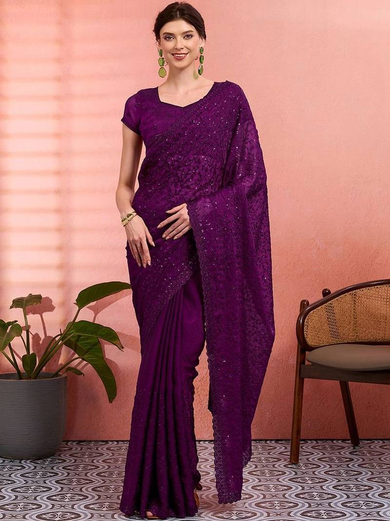 Purple ethnic embroidered festive wear saree with matching blouse