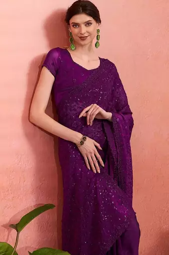 Purple ethnic embroidered festive wear saree with matching blouse