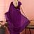 Purple ethnic embroidered festive wear saree with matching blouse