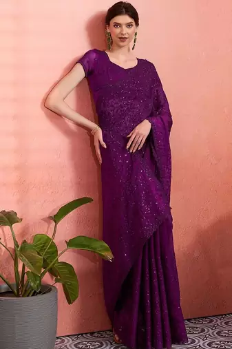 Purple ethnic embroidered festive wear saree with matching blouse