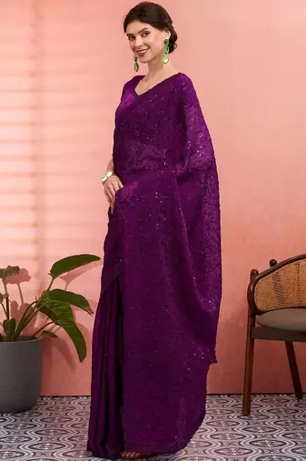 Purple ethnic embroidered festive wear saree with matching blouse