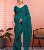 Teal ethnic embroidered festive wear saree with matching blouse