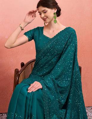 Teal ethnic embroidered festive wear saree with matching blouse 2
