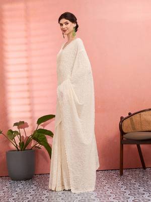 Off white ethnic embroidered festive wear saree with matching blouse 2