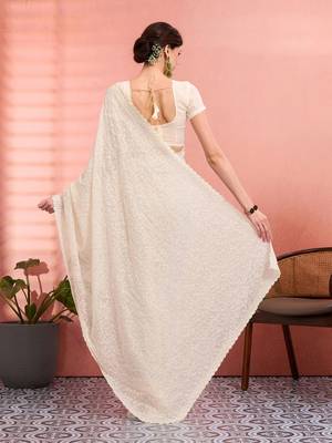 Off white ethnic embroidered festive wear saree with matching blouse 3