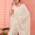 Off white ethnic embroidered festive wear saree with matching blouse