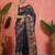 Black ethnic motifs printed saree with unstitched blouse