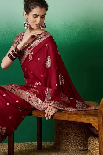Maroon ethnic motif zari woven tassel detail kanjeevaram saree