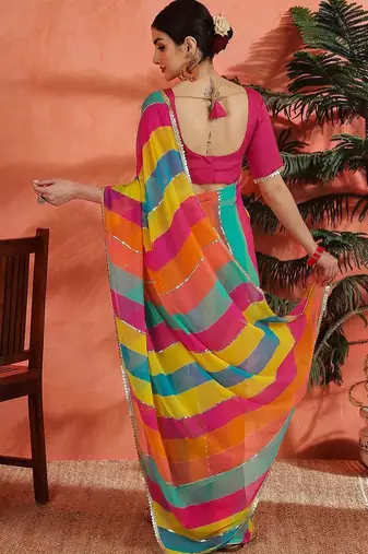 Pink striped embellished  georgette saree with unstitched  blouse