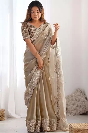 Beige tissue silk sequin embroideried scollped border festive blouse piece & sarees