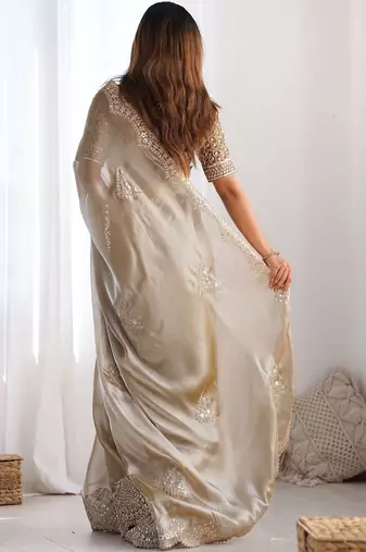 Beige tissue silk sequin embroideried scollped border festive blouse piece & sarees
