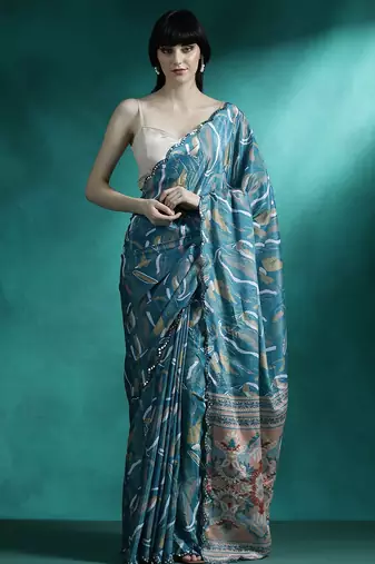 Teal geometric printed & embroidered saree with blouse