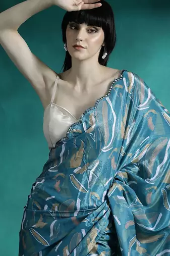 Teal geometric printed & embroidered saree with blouse
