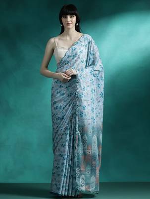 Turquoise geometric printed saree with blouse piece 1