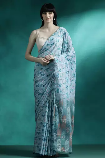 Turquoise geometric printed saree with blouse piece