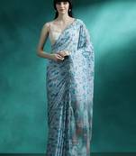 Turquoise geometric printed saree with blouse piece