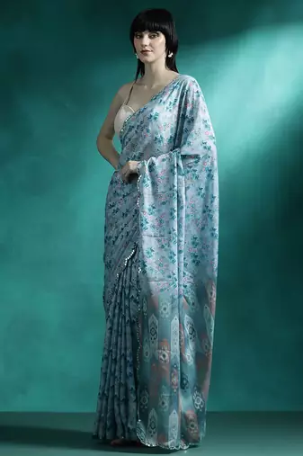 Turquoise geometric printed saree with blouse piece