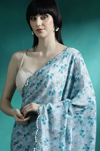 Turquoise geometric printed saree with blouse piece