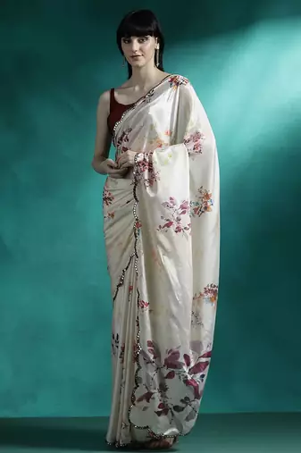 Cream printed & embroidered gotta patti poly chiffon saree with blouse