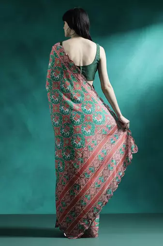 Green printed & embroidered saree with blouse