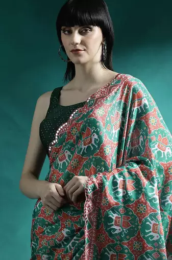 Green printed & embroidered saree with blouse