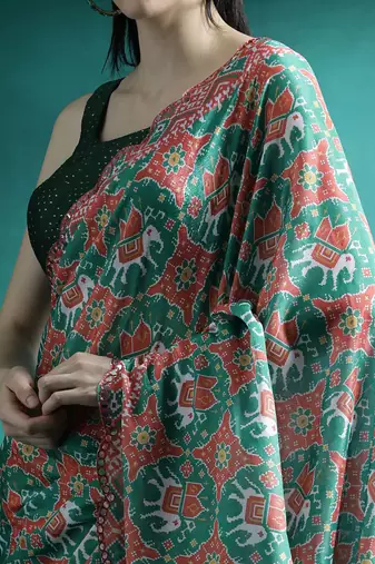 Green printed & embroidered saree with blouse