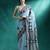 Turquoise woven design saree with blouse