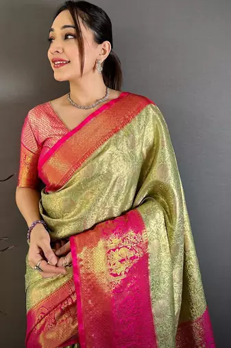 Green woven design zari silk blend kanjeevaram saree