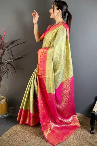 Green woven design zari silk blend kanjeevaram saree