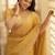 Yellow embellished embroidered sequinned saree with blouse piece