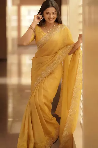 Yellow embellished embroidered sequinned saree with blouse piece