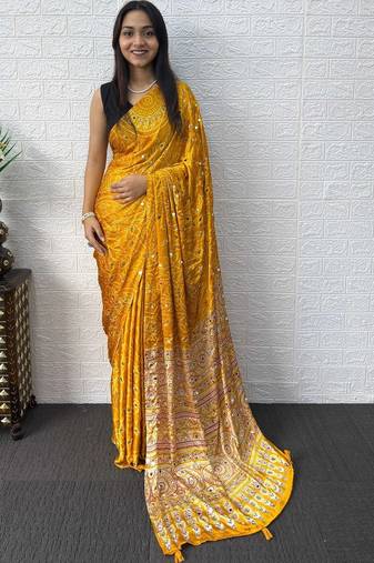 Yellow bandhani mirror work bandhani saree