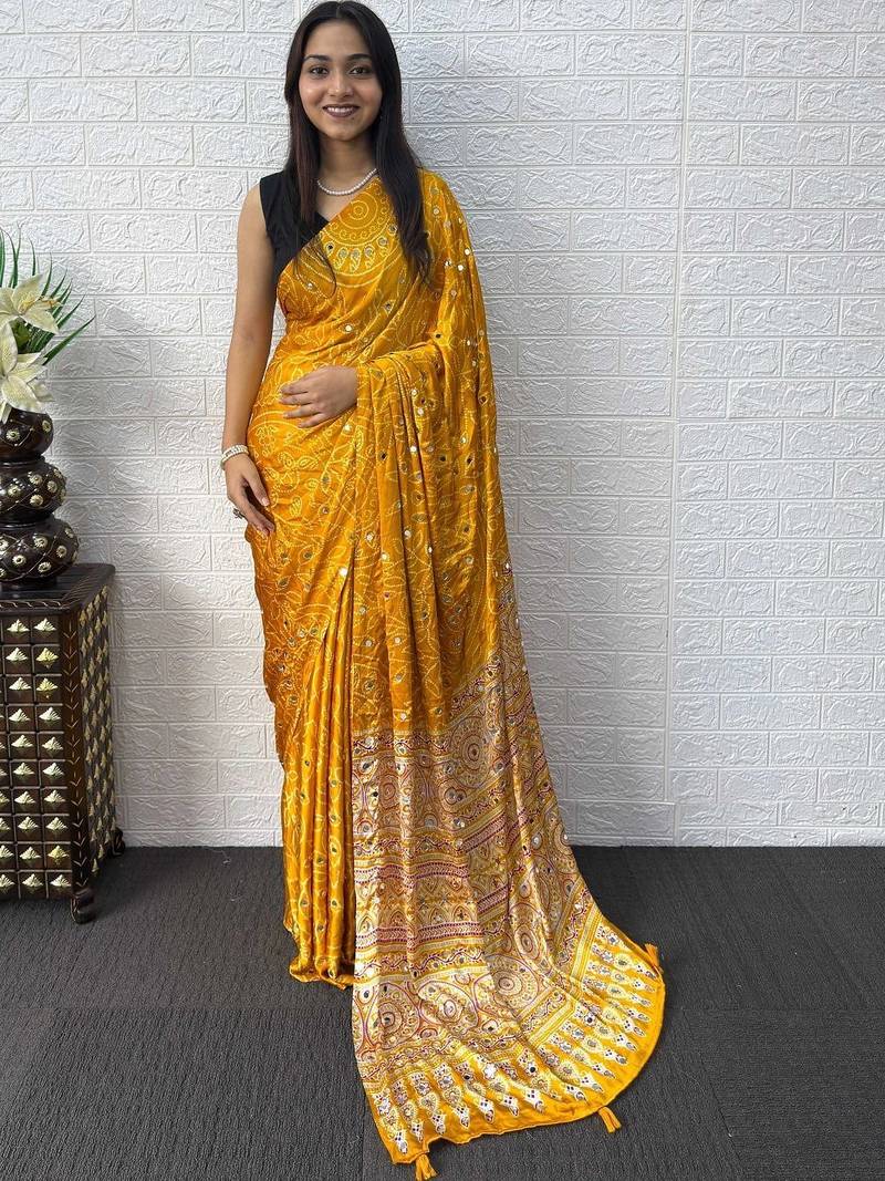 Yellow bandhani mirror work bandhani saree