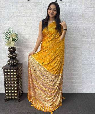 Yellow bandhani mirror work bandhani saree 2