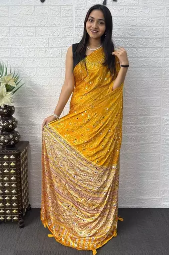 Yellow bandhani mirror work bandhani saree