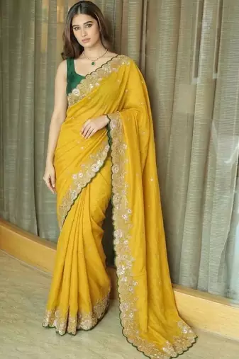 Yellow ethnic motifs embroidered  chiffon heavy work saree