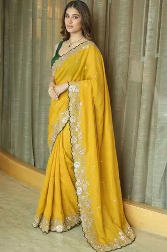 Yellow ethnic motifs embroidered  chiffon heavy work saree