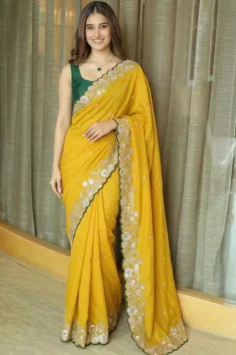 Yellow ethnic motifs embroidered  chiffon heavy work saree