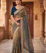 Gold embroidered silk blend saree