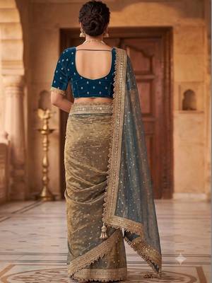 Gold embroidered silk blend saree 4
