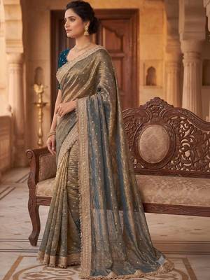 Gold embroidered silk blend saree 5