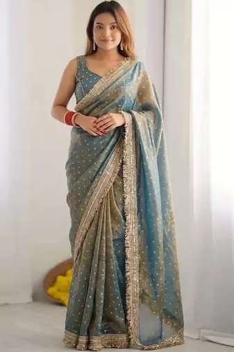 Teal embellished silk blend saree