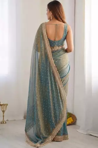 Teal embellished silk blend saree