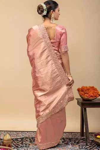 Peach embroidered tissue saree