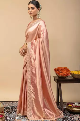 Peach embroidered tissue saree